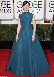 Felicity Jones in a high-neck sleaveless teal dress